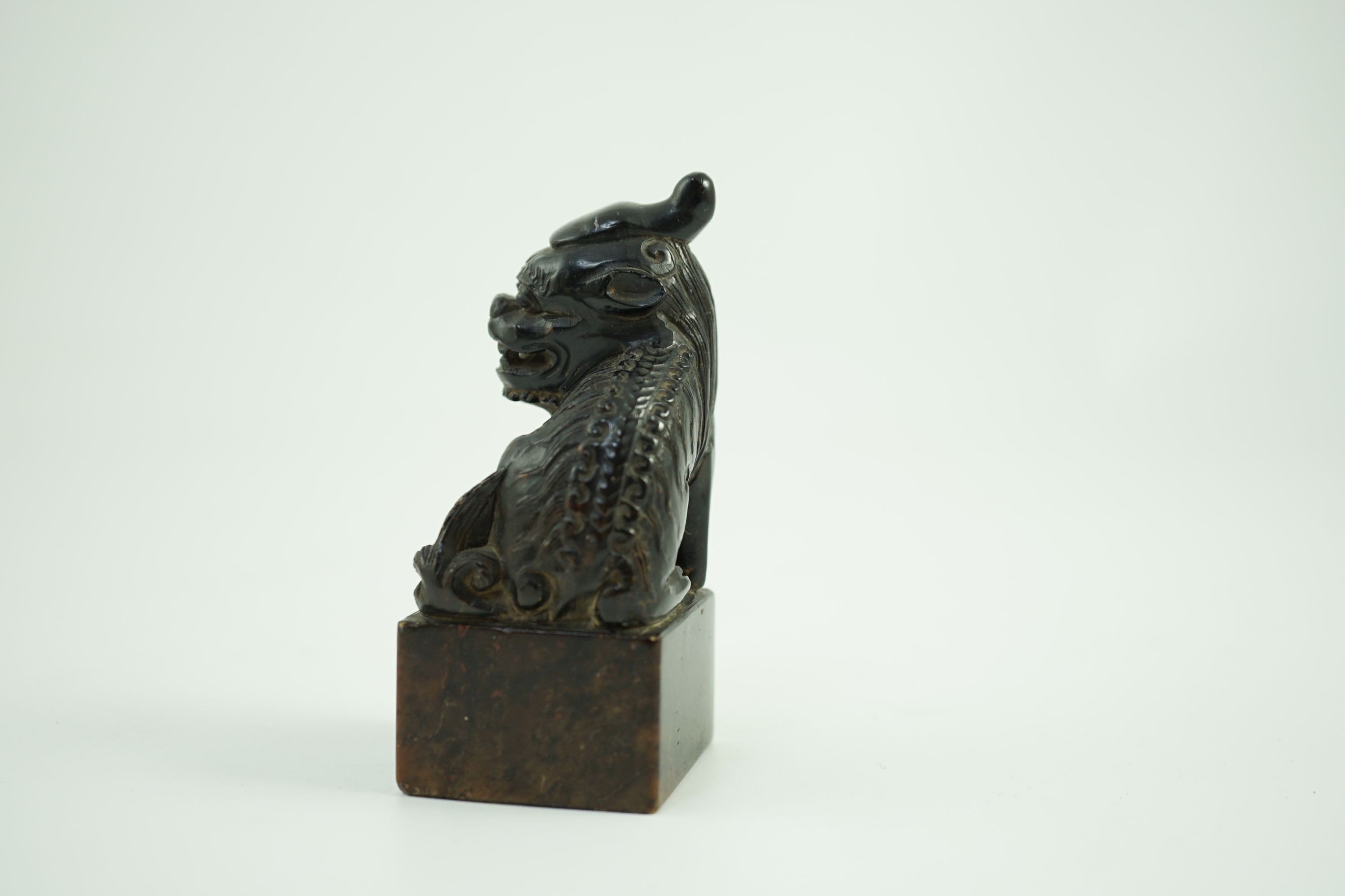 A Chinese soapstone pixiu (lion dog) seal, 9.5 cms high.